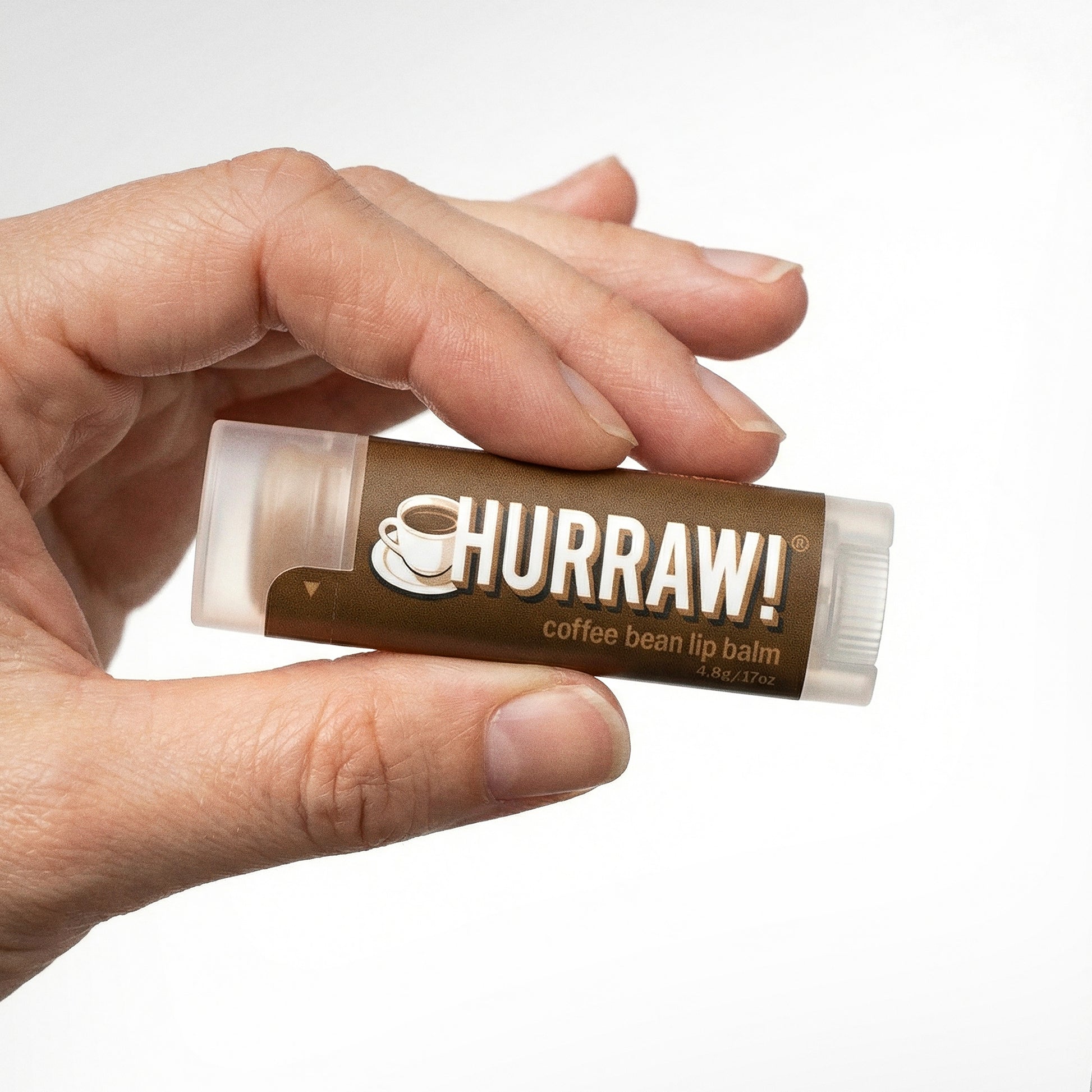 Hurraw koffie lippenbalsem productfoto op lichte achtergrond