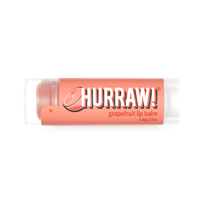 Hurraw grapefruit lippenbalsem productfoto in de hand