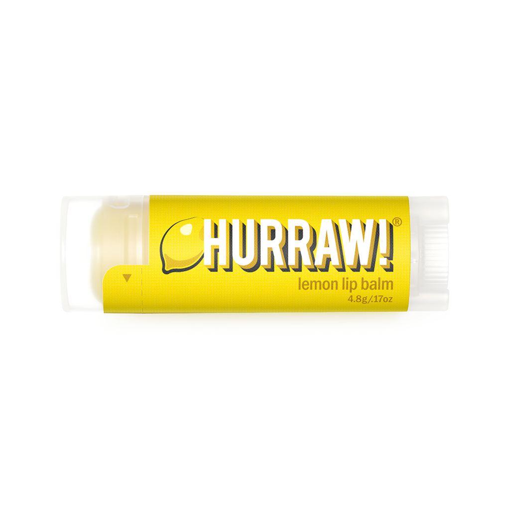 Hurraw citroen lippenbalsem productfoto op lichte achtergrond